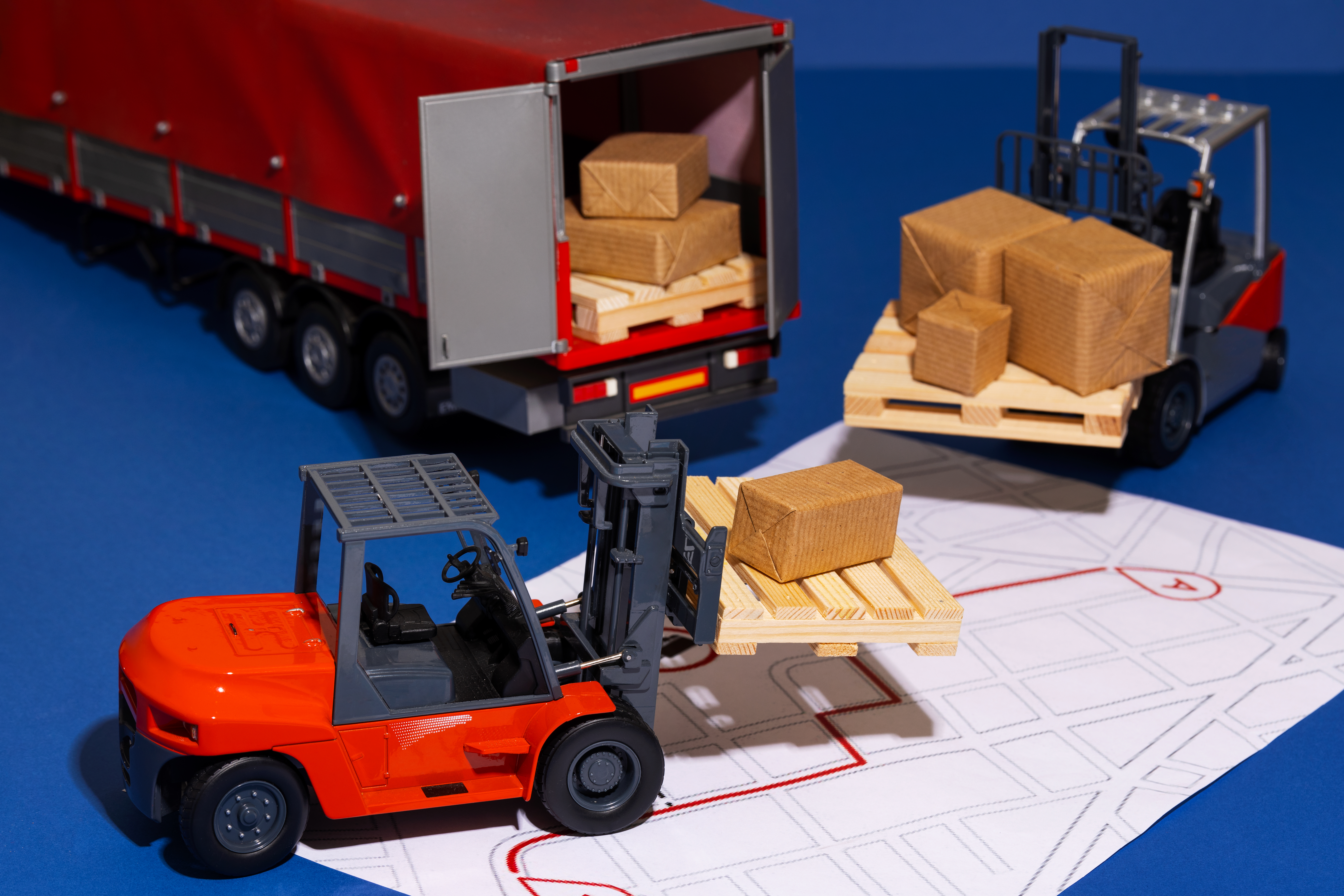 Illustration d'une carte logistique avec véhicules et icônes d'optimisation.